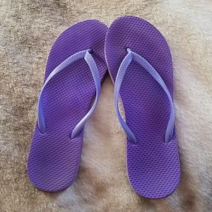 Purple flip flops